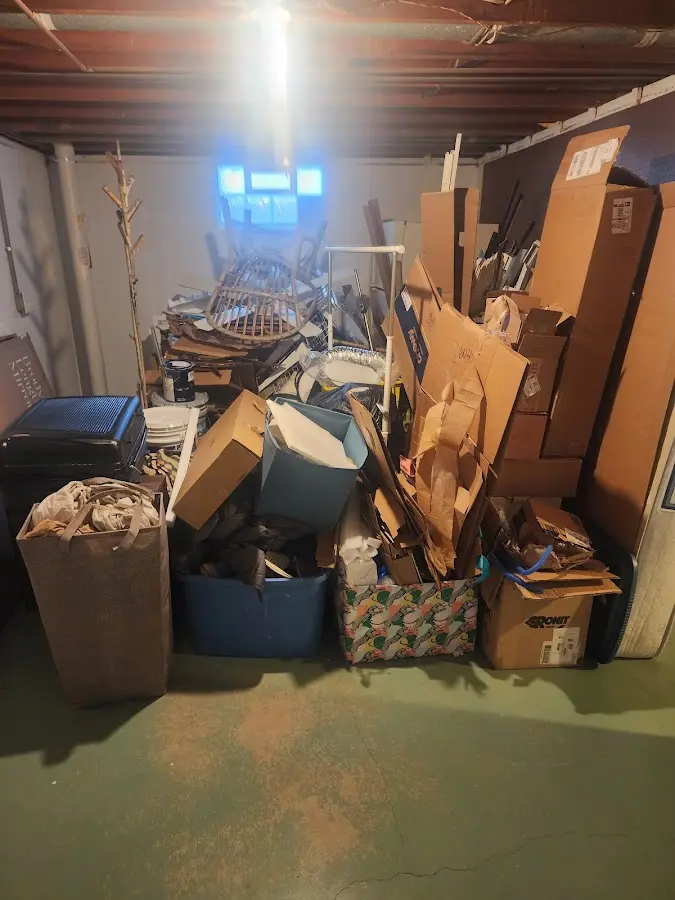 Roll-off dumpster container at job site for 20 Yard Dumpster Rental in Forest City